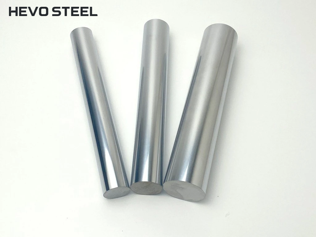 Three reflective solid rod sections with their end faces visible.