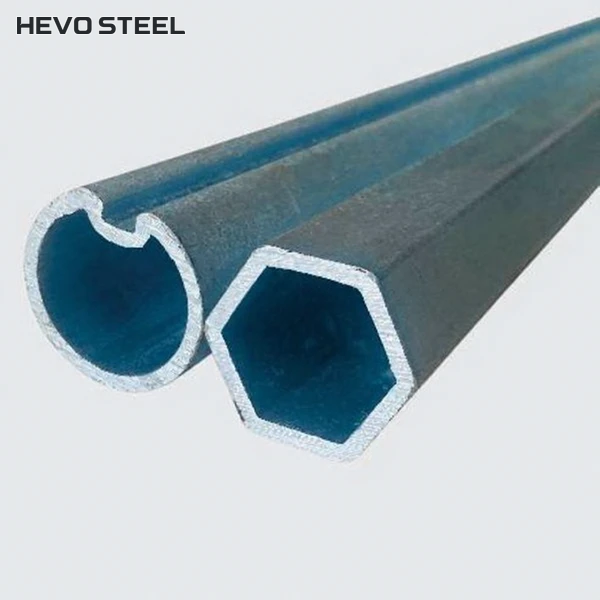 Grooved hollow round tube beside a tube with hexagonal outer and inner sections.